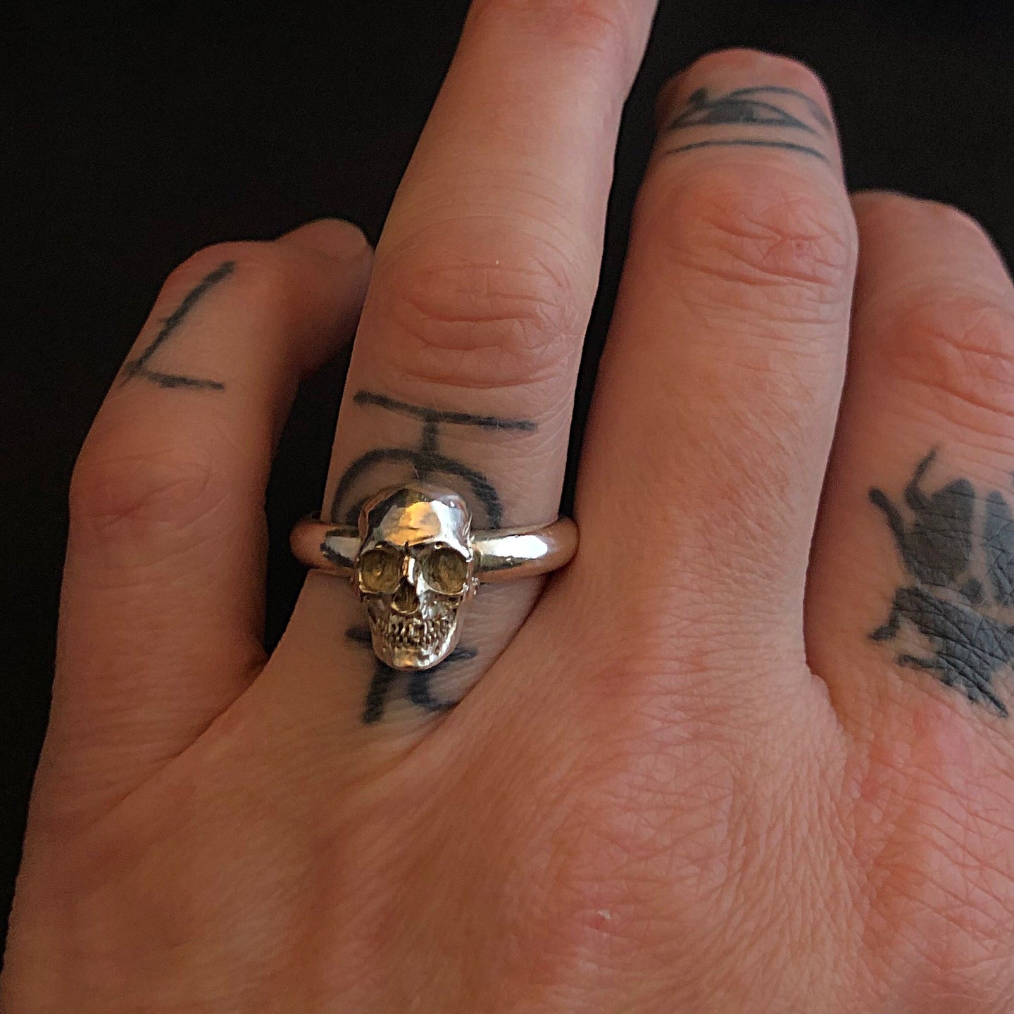 Kathleen wearing ossua-et-acroamata-jewelery-movie-props-trivia-gothic-goth-gothic-memento-mori-sterling-silver-925-full-skull-stacker-ring