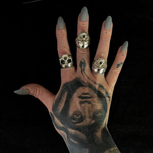 Kathleen wearing ossua-et-acroamata-jewelery-mythology-myth-gothic-goth-gothic-memento-mori-sterling-silver-925-Death-Mask-Ring